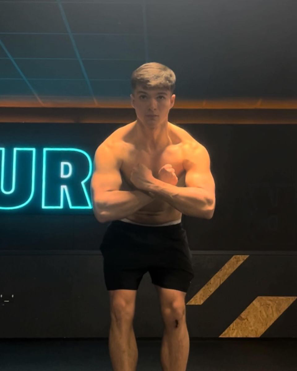 guy flexing his muscles
